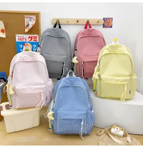 Lockerer karierter Rucksack für Schüler, großer Kapazität Freizeittasche in mehreren bunten Farben.