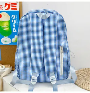 Blauer karierter Schulrucksack fuer Studenten, laessiger Reise-Tagesrucksack gross.