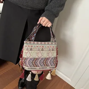 Borsa a tracolla etnica con nappe, borsa a mano geometrica tessuta per viaggio donna.