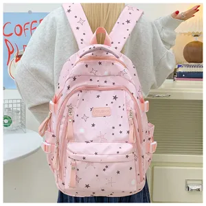 Cute pink star print large capacity backpack for daily school and casual commute use.