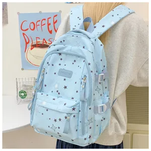 Light blue star print school backpack for students, large capacity casual daypack daily use.