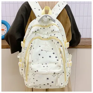 Detailed view of the large capacity school backpack with star pattern, casual commuter bag for students.