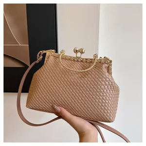 Chic woven shoulder bag for women, elegant kiss-lock evening bag with pearls and chain strap.