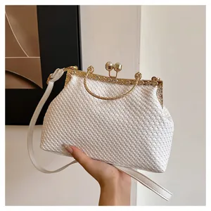 Elegant white woven kiss-lock evening bag with pearl clasp and rhinestone gold frame for women