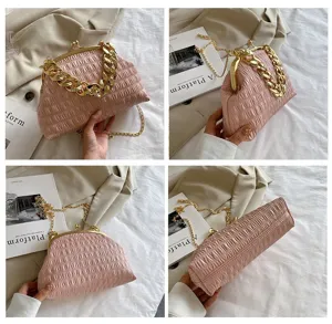 Stylish pink pleated shoulder bag with gold chain, chic daily crossbody handbag for women.