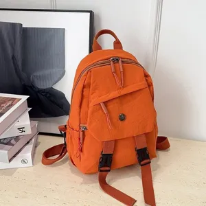 Casual oranje rugzak voor dames en studenten, stijlvolle schooltas voor dagelijks reizen.