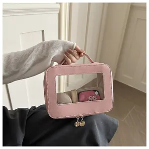Borsa cosmetica rosa con finestra trasparente, borsa minimalista per viaggi e trucco.