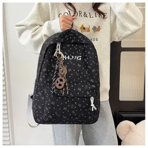 Black bow print casual backpack outdoor travel school bag with front pocket and cute charms for women