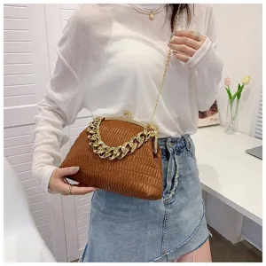 Detailed view of the stylish brown pleated crossbody bag with a chic thick gold chain accent.