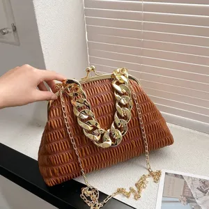 Minimalist brown ruched shoulder handbag with chunky gold chain for women commuting.