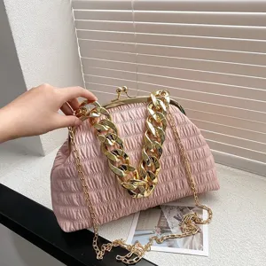 Women pink pleated shoulder bag with chunky gold chain, stylish casual crossbody messenger.