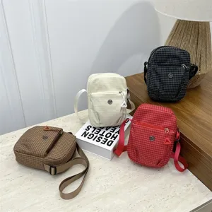 Casual mini crossbody phone bag for women, lightweight waterproof nylon shoulder bag with multi-color options.