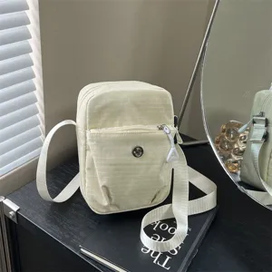 Casual mini crossbody bag for women, lightweight canvas shoulder phone bag for daily use.
