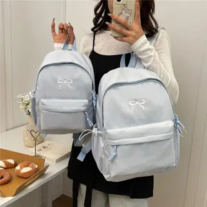 Sweet Japanese style backpack for students, light blue bow embroidered cute school bag.