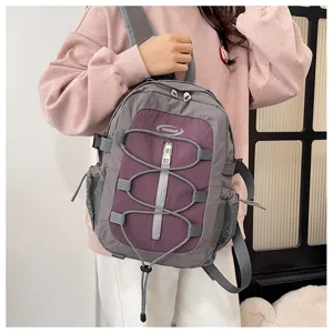 Stylish color-block casual backpack for daily travel, lightweight and trendy design.