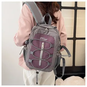 Forest style colorblock backpack with bungee cord, lightweight casual daypack for travel and school.