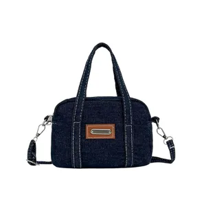 Retro Damen Handtasche aus Jeansstoff, modische Umhängetasche mit Griffen und Riemen.