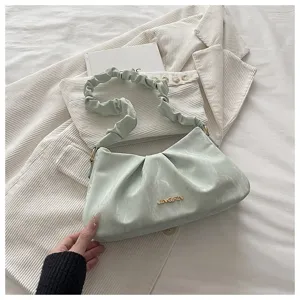 Korean style ruched underarm bag for women, trendy cloud shoulder bag in light green color.
