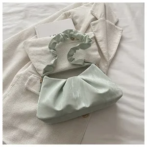 Chic green pleated underarm shoulder bag with soft cloud design, stylish minimalist purse.