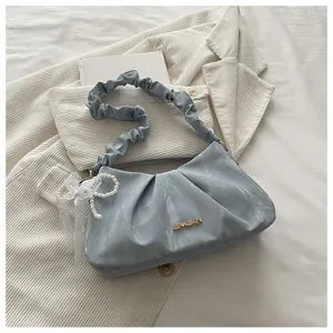 Korean style ruched cloud shoulder bag for women, featuring elegant pearl lace bow and metal logo.