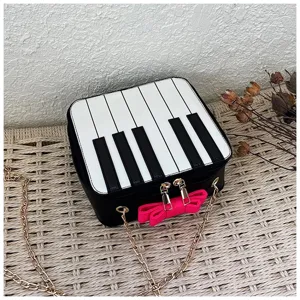 Black white piano keys crossbody bag mini cute shoulder bag with chain and pink bow