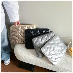 Glossy quilted PU large capacity laptop sleeve clutch bag, detail view showing metallic colors.