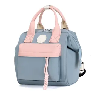 Multifunctional grey pink diaper backpack stylish mommy travel handbag for daily mother use