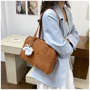 Casual large capacity women shoulder bag solid color commuting handbag with cute puppy charm