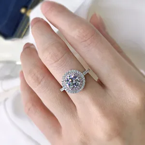 Stunning S925 silver pink halo ring featuring sparkling brilliant cut center stone and micro pave.