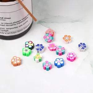 Colorful polymer clay flower beads for DIY jewelry making and handmade bracelets.