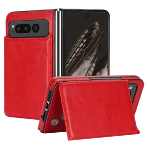 Red leather folding phone case close-up showing card slot pocket and hinge details.