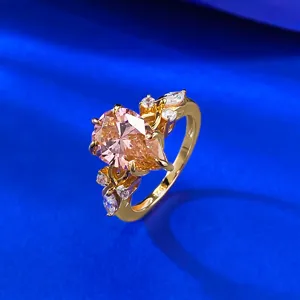 Close-up detail of the stunning S925 silver pear-shaped padparadscha ring with sparkling stones.
