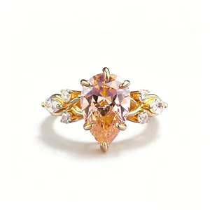 Stunning S925 silver pear-cut padparadscha ring featuring elegant vine and sparkling crystal details.