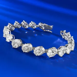 Close-up detail of luxurious oval cut cubic zirconia silver tennis bracelet sparkle.