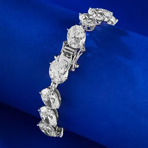 Stunning oval cut diamond tennis bracelet close-up, premium S925 silver luxury jewelry line.