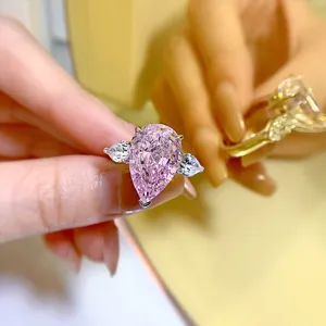 Lujo 925 plata rosa talla pera diamante alto carbono tres piedras anillo mujer