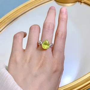 S925 silver pear shaped olive green high carbon diamond ring detail closeup elegant jewelry women