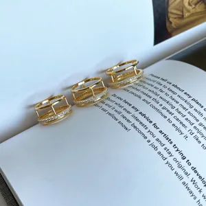 Gold double-layer ring featuring sparkling cubic zirconia pavé set on S925 silver.