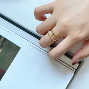 Gold double band ring detail view, minimalist 925 silver jewelry showcasing fine craftsmanship.