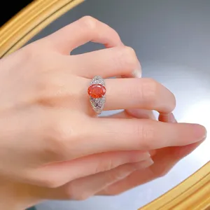 S925 silver ring featuring 7x9mm oval sunset orange simulated diamond with quilted band detail.