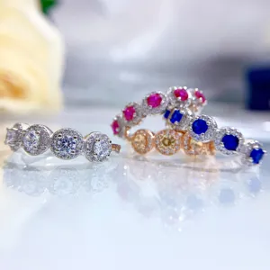Sparkling silver multi-stone ring detail, stunning halo cluster simulated diamond jewelry piece.