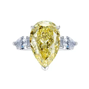 Superbe bague en argent 925 avec diamant jaune poire et pierres scintillantes élégante.