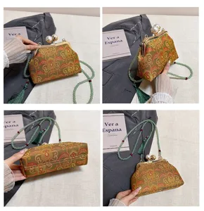 Chinese stijl retro brokaat schelp handtas met kralenriem en elegante kwast voor vrouwen.