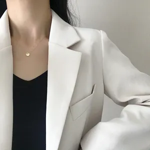 Minimalist gold round pendant necklace for women, elegant sterling silver clavicle chain detail.
