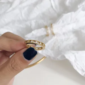 Detailed view of the exquisite S925 silver gold-plated ring with sparkling star zircons.