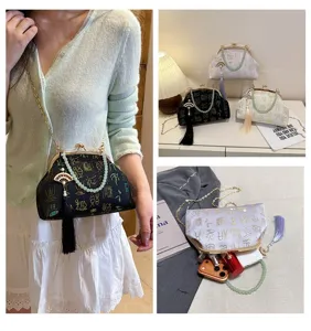 Chinese vintage style kiss-lock shoulder bag jacquard embroidered evening bag with tassel
