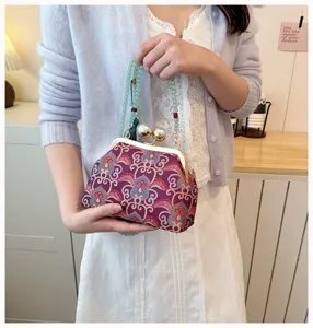 Chinese stijl vintage schelp tas met parel handvat en knipsluiting voor vrouwen.