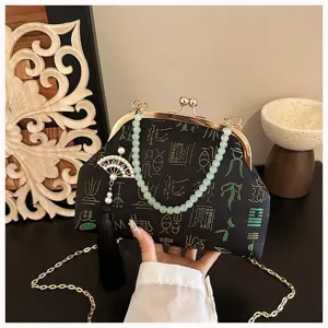 Chinese style vintage kiss lock evening bag with embroidery, jade beads handle and tassel.