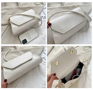 Weisse Kroko Muster Schultertasche Detailansicht, schicke Baguette Handtasche fuer Damen.