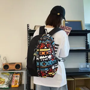 Trendy black ethnic geometric backpack large capacity school bag for daily commute and students.